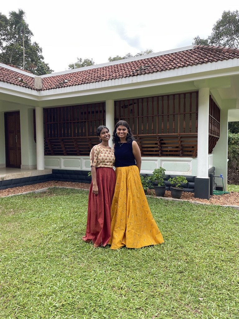 Mariya and Rebecca in front of the tharavadu verandah