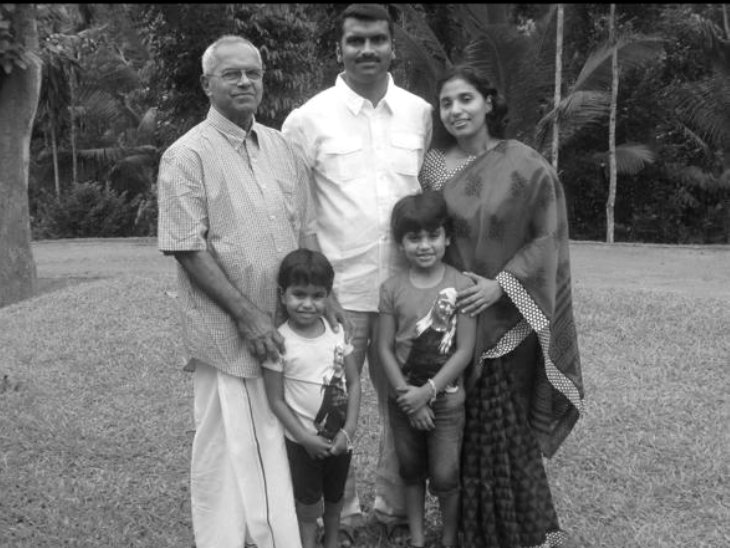 K. K. Chandy with Kurian, Sandhya and their two young daughters on the lawn