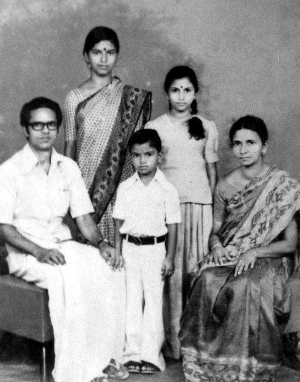 Studio portrait of K. K. Chandy and Rebecca with their three children